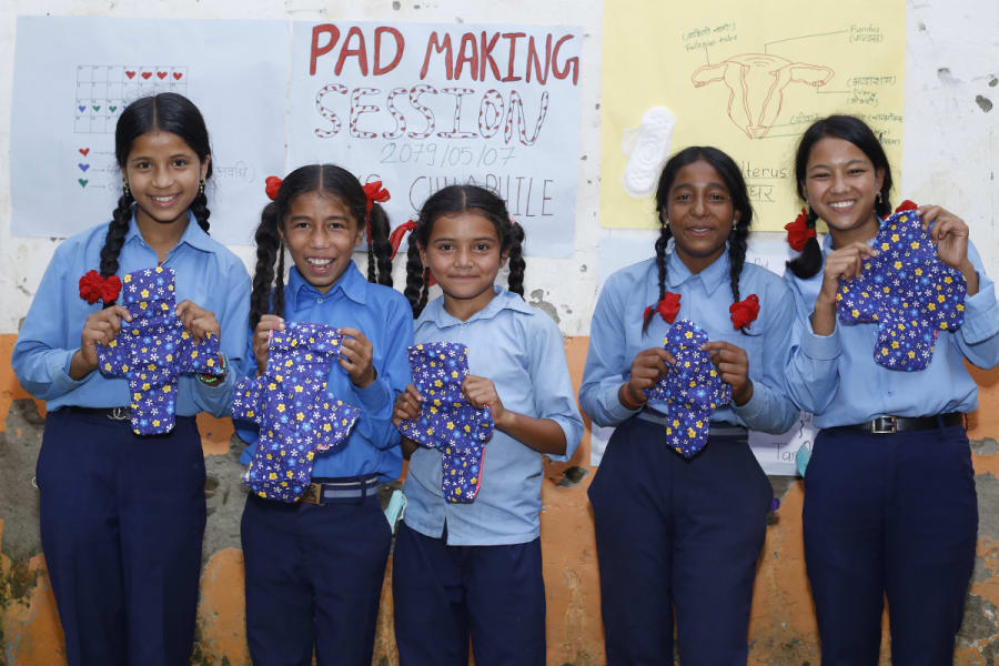 Girls’ Club members in Nepal, making reusable sanitary pads.